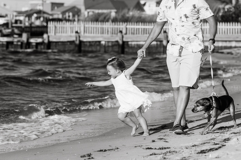 Sunset family session at Lavallette Beach NJ with my previous wedding couple Christina and JR. Christina and JR got married in 2017 at Molly Pitcher Inn in Red Bank NJ and now they have two charming daughters becoming family of four! It’s always so good seeing old wedding clients with their growing family. Christina and JR’s family session down Jersey Shore town Lavallette NJ was especially meaningful to them because it’s where Christina and JR both grew up. The beach, sand, most amazing sunset is all very familiar to Christina and JR and it was so amazing photographing them with their two beautiful daughters. Christina, JR, Karlie and Maddy’s family session photographed by Karis from HeyKaris. 