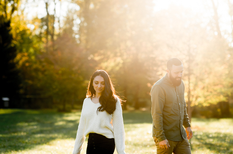 Chilly fall morning, feeling icy wind on our skin at Cross Estate Gardens for Allie and Nick’s engagement session. What we expected to be a warm morning ended up being freezing but once the sun came up the warmth followed. To warm Allie and Nick up little bit, I had them run across the field toward the sunrise, most gorgeous scene to be watching by myself. Cross Estate Gardens with it’s unique variety of backdrops it’s a photographer’s dream location really. It was so early that we were the only people there and with Allie and Nick we got to know each other and I documented their love at Cross Estate Gardens NJ. Cross Estate Gardens NJ engagement with Allie and Nick photographed by Karis from Hey Karis. Photograph is like freezing time, motion in print, movie turned into a book. 