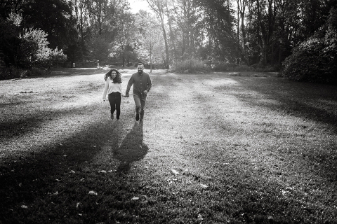 Chilly fall morning, feeling icy wind on our skin at Cross Estate Gardens for Allie and Nick’s engagement session. What we expected to be a warm morning ended up being freezing but once the sun came up the warmth followed. To warm Allie and Nick up little bit, I had them run across the field toward the sunrise, most gorgeous scene to be watching by myself. Cross Estate Gardens with it’s unique variety of backdrops it’s a photographer’s dream location really. It was so early that we were the only people there and with Allie and Nick we got to know each other and I documented their love at Cross Estate Gardens NJ. Cross Estate Gardens NJ engagement with Allie and Nick photographed by Karis from Hey Karis. Photograph is like freezing time, motion in print, movie turned into a book. 