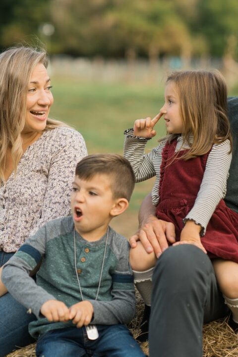 Fall is in full swing here in NJ, my first Fall Family session with Anna and Adam at their Farm House in Hackettstown NJ. Anna and Adam recently purchased their dream farm house on a 4 acres of land. This family of four now has chickens, ducks, birds, cats, a dog, sheep and plans to add many more to the list in the future. I had the honor of visiting Anna and Adam and their two beautiful children at their Farm the other day. I got much need vitamin D walking around the property, enjoying the foliage, running around with their kids and meeting all the farm animals. I sincerely enjoy photographing families now because there are no dull moments with kids, every moment is perfect! Fall family session at Anna and Adam’s Farm at Hackettstown NJ photographed by Karis from HeyKaris. 