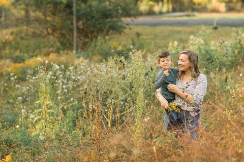 Fall is in full swing here in NJ, my first Fall Family session with Anna and Adam at their Farm House in Hackettstown NJ. Anna and Adam recently purchased their dream farm house on a 4 acres of land. This family of four now has chickens, ducks, birds, cats, a dog, sheep and plans to add many more to the list in the future. I had the honor of visiting Anna and Adam and their two beautiful children at their Farm the other day. I got much need vitamin D walking around the property, enjoying the foliage, running around with their kids and meeting all the farm animals. I sincerely enjoy photographing families now because there are no dull moments with kids, every moment is perfect! Fall family session at Anna and Adam’s Farm at Hackettstown NJ photographed by Karis from HeyKaris. 