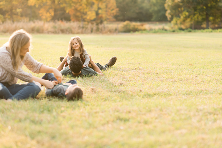 Fall is in full swing here in NJ, my first Fall Family session with Anna and Adam at their Farm House in Hackettstown NJ. Anna and Adam recently purchased their dream farm house on a 4 acres of land. This family of four now has chickens, ducks, birds, cats, a dog, sheep and plans to add many more to the list in the future. I had the honor of visiting Anna and Adam and their two beautiful children at their Farm the other day. I got much need vitamin D walking around the property, enjoying the foliage, running around with their kids and meeting all the farm animals. I sincerely enjoy photographing families now because there are no dull moments with kids, every moment is perfect! Fall family session at Anna and Adam’s Farm at Hackettstown NJ photographed by Karis from HeyKaris.