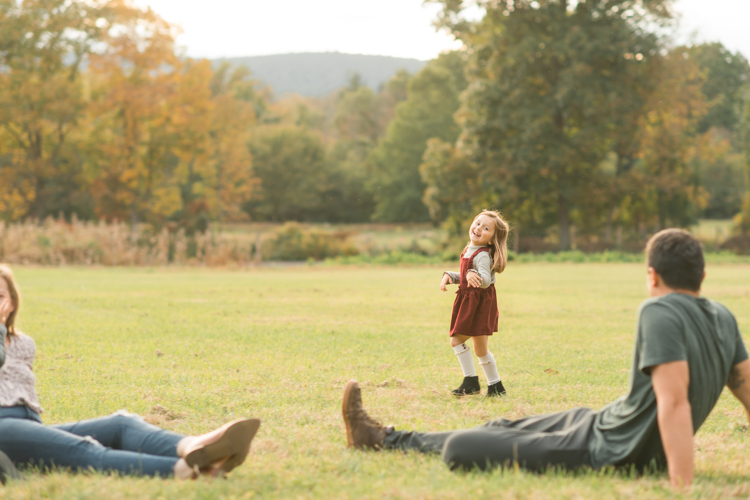Fall is in full swing here in NJ, my first Fall Family session with Anna and Adam at their Farm House in Hackettstown NJ. Anna and Adam recently purchased their dream farm house on a 4 acres of land. This family of four now has chickens, ducks, birds, cats, a dog, sheep and plans to add many more to the list in the future. I had the honor of visiting Anna and Adam and their two beautiful children at their Farm the other day. I got much need vitamin D walking around the property, enjoying the foliage, running around with their kids and meeting all the farm animals. I sincerely enjoy photographing families now because there are no dull moments with kids, every moment is perfect! Fall family session at Anna and Adam’s Farm at Hackettstown NJ photographed by Karis from HeyKaris.