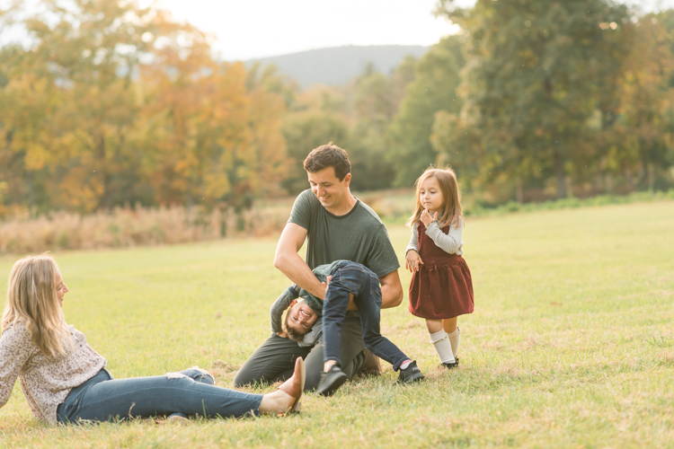 Fall is in full swing here in NJ, my first Fall Family session with Anna and Adam at their Farm House in Hackettstown NJ. Anna and Adam recently purchased their dream farm house on a 4 acres of land. This family of four now has chickens, ducks, birds, cats, a dog, sheep and plans to add many more to the list in the future. I had the honor of visiting Anna and Adam and their two beautiful children at their Farm the other day. I got much need vitamin D walking around the property, enjoying the foliage, running around with their kids and meeting all the farm animals. I sincerely enjoy photographing families now because there are no dull moments with kids, every moment is perfect! Fall family session at Anna and Adam’s Farm at Hackettstown NJ photographed by Karis from HeyKaris.
