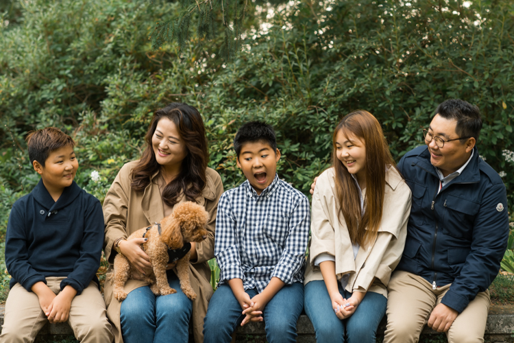 Esther and Thomas’ Fall family session at NJ Botanical Garden with three of their older children were so much to photograph since older kids tend to follow direction better. But I can not do cute little poses that I do with younger children. I thought to myself what would Wes Anderson do? Something more abstract and something fun. Bigger and older kids needed big actions and something not cheesy. Photographing older kids were bit challenging at first but I think we all had some fun and got some good photos for Esther and Thomas’ family. Esther and Thomas’ fall family session at NJ Botanical Garden photographed by Karis from Hey Karis. Photograph is like freezing time, motion in print, movie turned into a book.