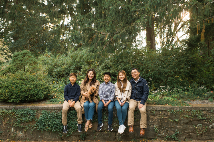 Esther and Thomas’ Fall family session at NJ Botanical Garden with three of their older children were so much to photograph since older kids tend to follow direction better. But I can not do cute little poses that I do with younger children. I thought to myself what would Wes Anderson do? Something more abstract and something fun. Bigger and older kids needed big actions and something not cheesy. Photographing older kids were bit challenging at first but I think we all had some fun and got some good photos for Esther and Thomas’ family. Esther and Thomas’ fall family session at NJ Botanical Garden photographed by Karis from Hey Karis. Photograph is like freezing time, motion in print, movie turned into a book.
