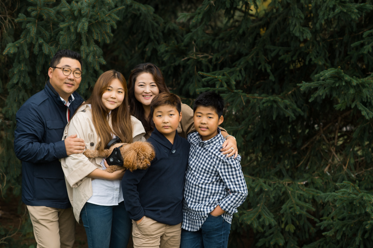 Esther and Thomas’ Fall family session at NJ Botanical Garden with three of their older children were so much to photograph since older kids tend to follow direction better. But I can not do cute little poses that I do with younger children. I thought to myself what would Wes Anderson do? Something more abstract and something fun. Bigger and older kids needed big actions and something not cheesy. Photographing older kids were bit challenging at first but I think we all had some fun and got some good photos for Esther and Thomas’ family. Esther and Thomas’ fall family session at NJ Botanical Garden photographed by Karis from Hey Karis. Photograph is like freezing time, motion in print, movie turned into a book.