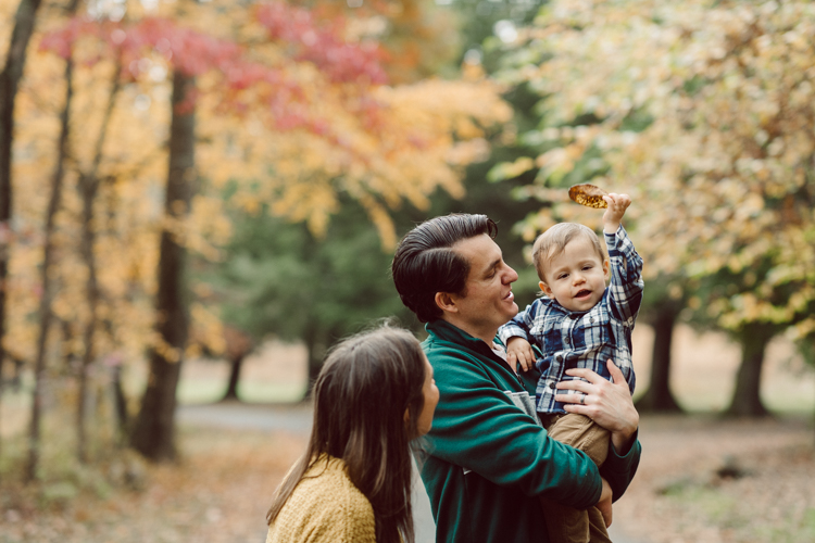 Alison, Brian and Lucas met me at The Cross Estate Gardens for a perfect fall family session. The weather was perfectly overcast giving that deep rich colors! Fall foliages were even more yellow, red and green. Like all other toddlers, Lucas did not want to stand pretty in front of my camera but that’s ok, I am mobile, pretty fast, and love a toddler w personality and character! Alison, Brian and Lucas’ fall adventure at the Cross Estate Gardens photographed by Karis from Hey Karis. Photograph is like freezing time, motion in print, movie turned into a book. Now booking 2021 and 2022 weddings.