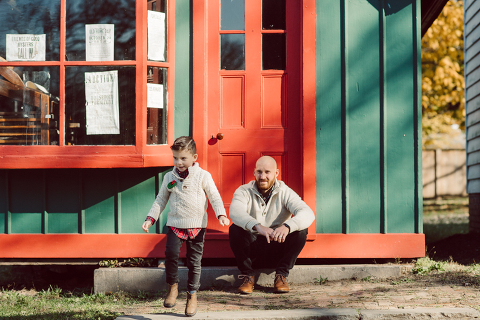 Brooke reached out to me for holiday family session and she had plans, props and we were all looking forward to Brooke and Mike’s holiday family session with their two kids Grace and Tommy at Historic Richmond Town in Staten Island NY. Brooke and Mike are from Staten Island and they did not live too far from Historic Richmond Town and they decorate the whole town pretty festive so we decide to meet there. But like all plans Brooke’s big hope for her very first professional photoshoot didn’t go as she planed. Her two kids Grace and Tommy were not having it. As soon as they got to the parking lot Tommy fell asleep. Grace was shy and scared to have her photos taken by a stranger photographer me. But we tried and got some good cute photos, and some not so cute and grumpy photos as well. Brooke, Mike, Grace and Tommy’s Historic Richmond Town Staten Island Holiday Family session documented and  photographed by Karis from Hey Karis. Photograph is like freezing time, motion in print, movie turned into a book. Now booking 2021 and 2022 weddings.