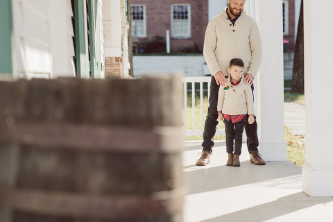 Brooke reached out to me for holiday family session and she had plans, props and we were all looking forward to Brooke and Mike’s holiday family session with their two kids Grace and Tommy at Historic Richmond Town in Staten Island NY. Brooke and Mike are from Staten Island and they did not live too far from Historic Richmond Town and they decorate the whole town pretty festive so we decide to meet there. But like all plans Brooke’s big hope for her very first professional photoshoot didn’t go as she planed. Her two kids Grace and Tommy were not having it. As soon as they got to the parking lot Tommy fell asleep. Grace was shy and scared to have her photos taken by a stranger photographer me. But we tried and got some good cute photos, and some not so cute and grumpy photos as well. Brooke, Mike, Grace and Tommy’s Historic Richmond Town Staten Island Holiday Family session documented and  photographed by Karis from Hey Karis. Photograph is like freezing time, motion in print, movie turned into a book. Now booking 2021 and 2022 weddings.