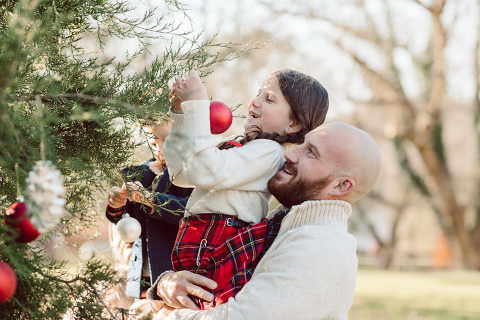 Brooke reached out to me for holiday family session and she had plans, props and we were all looking forward to Brooke and Mike’s holiday family session with their two kids Grace and Tommy at Historic Richmond Town in Staten Island NY. Brooke and Mike are from Staten Island and they did not live too far from Historic Richmond Town and they decorate the whole town pretty festive so we decide to meet there. But like all plans Brooke’s big hope for her very first professional photoshoot didn’t go as she planed. Her two kids Grace and Tommy were not having it. As soon as they got to the parking lot Tommy fell asleep. Grace was shy and scared to have her photos taken by a stranger photographer me. But we tried and got some good cute photos, and some not so cute and grumpy photos as well. Brooke, Mike, Grace and Tommy’s Historic Richmond Town Staten Island Holiday Family session documented and  photographed by Karis from Hey Karis. Photograph is like freezing time, motion in print, movie turned into a book. Now booking 2021 and 2022 weddings.