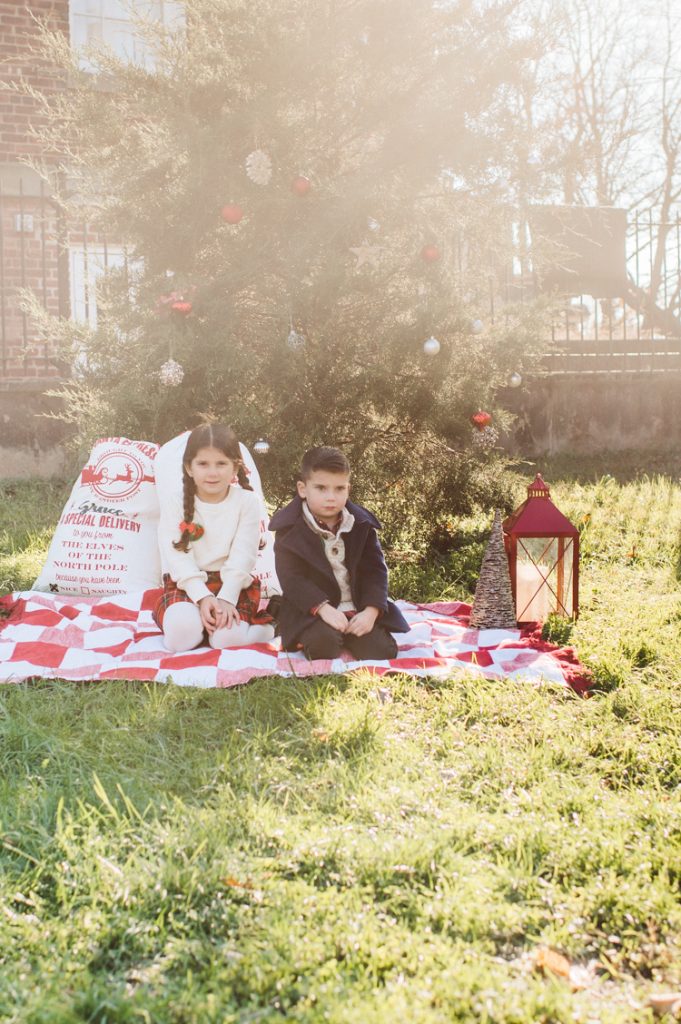 Brooke reached out to me for holiday family session and she had plans, props and we were all looking forward to Brooke and Mike’s holiday family session with their two kids Grace and Tommy at Historic Richmond Town in Staten Island NY. Brooke and Mike are from Staten Island and they did not live too far from Historic Richmond Town and they decorate the whole town pretty festive so we decide to meet there. But like all plans Brooke’s big hope for her very first professional photoshoot didn’t go as she planed. Her two kids Grace and Tommy were not having it. As soon as they got to the parking lot Tommy fell asleep. Grace was shy and scared to have her photos taken by a stranger photographer me. But we tried and got some good cute photos, and some not so cute and grumpy photos as well. Brooke, Mike, Grace and Tommy’s Historic Richmond Town Staten Island Holiday Family session documented and photographed by Karis from Hey Karis. Photograph is like freezing time, motion in print, movie turned into a book. Now booking 2021 and 2022 weddings.