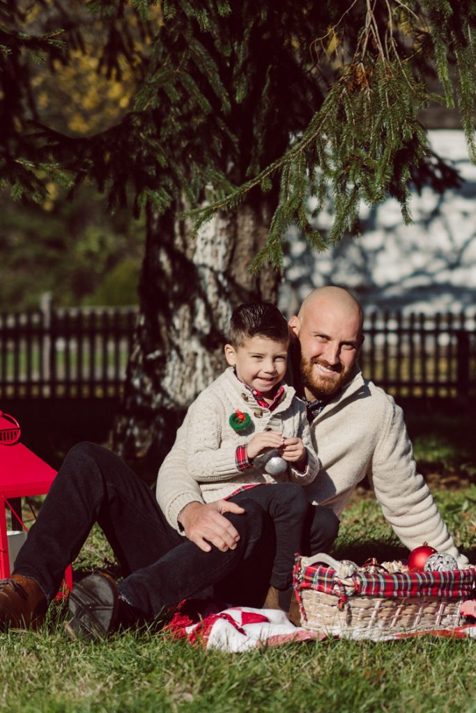 Brooke reached out to me for holiday family session and she had plans, props and we were all looking forward to Brooke and Mike’s holiday family session with their two kids Grace and Tommy at Historic Richmond Town in Staten Island NY. Brooke and Mike are from Staten Island and they did not live too far from Historic Richmond Town and they decorate the whole town pretty festive so we decide to meet there. But like all plans Brooke’s big hope for her very first professional photoshoot didn’t go as she planed. Her two kids Grace and Tommy were not having it. As soon as they got to the parking lot Tommy fell asleep. Grace was shy and scared to have her photos taken by a stranger photographer me. But we tried and got some good cute photos, and some not so cute and grumpy photos as well. Brooke, Mike, Grace and Tommy’s Historic Richmond Town Staten Island Holiday Family session documented and photographed by Karis from Hey Karis. Photograph is like freezing time, motion in print, movie turned into a book. Now booking 2021 and 2022 weddings.