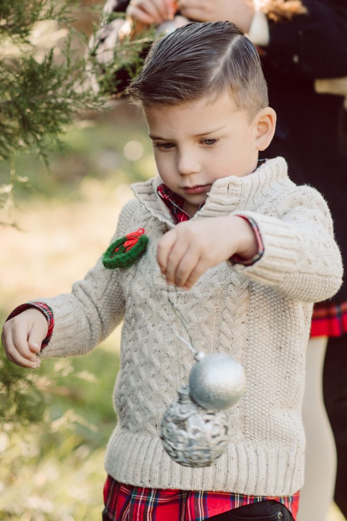 Brooke reached out to me for holiday family session and she had plans, props and we were all looking forward to Brooke and Mike’s holiday family session with their two kids Grace and Tommy at Historic Richmond Town in Staten Island NY. Brooke and Mike are from Staten Island and they did not live too far from Historic Richmond Town and they decorate the whole town pretty festive so we decide to meet there. But like all plans Brooke’s big hope for her very first professional photoshoot didn’t go as she planed. Her two kids Grace and Tommy were not having it. As soon as they got to the parking lot Tommy fell asleep. Grace was shy and scared to have her photos taken by a stranger photographer me. But we tried and got some good cute photos, and some not so cute and grumpy photos as well. Brooke, Mike, Grace and Tommy’s Historic Richmond Town Staten Island Holiday Family session documented and photographed by Karis from Hey Karis. Photograph is like freezing time, motion in print, movie turned into a book. Now booking 2021 and 2022 weddings.