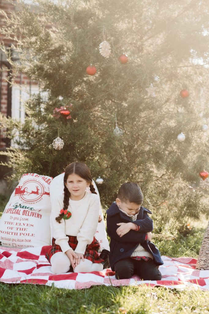 Brooke reached out to me for holiday family session and she had plans, props and we were all looking forward to Brooke and Mike’s holiday family session with their two kids Grace and Tommy at Historic Richmond Town in Staten Island NY. Brooke and Mike are from Staten Island and they did not live too far from Historic Richmond Town and they decorate the whole town pretty festive so we decide to meet there. But like all plans Brooke’s big hope for her very first professional photoshoot didn’t go as she planed. Her two kids Grace and Tommy were not having it. As soon as they got to the parking lot Tommy fell asleep. Grace was shy and scared to have her photos taken by a stranger photographer me. But we tried and got some good cute photos, and some not so cute and grumpy photos as well. Brooke, Mike, Grace and Tommy’s Historic Richmond Town Staten Island Holiday Family session documented and photographed by Karis from Hey Karis. Photograph is like freezing time, motion in print, movie turned into a book. Now booking 2021 and 2022 weddings.