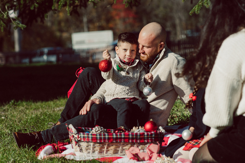 Brooke reached out to me for holiday family session and she had plans, props and we were all looking forward to Brooke and Mike’s holiday family session with their two kids Grace and Tommy at Historic Richmond Town in Staten Island NY. Brooke and Mike are from Staten Island and they did not live too far from Historic Richmond Town and they decorate the whole town pretty festive so we decide to meet there. But like all plans Brooke’s big hope for her very first professional photoshoot didn’t go as she planed. Her two kids Grace and Tommy were not having it. As soon as they got to the parking lot Tommy fell asleep. Grace was shy and scared to have her photos taken by a stranger photographer me. But we tried and got some good cute photos, and some not so cute and grumpy photos as well. Brooke, Mike, Grace and Tommy’s Historic Richmond Town Staten Island Holiday Family session documented and  photographed by Karis from Hey Karis. Photograph is like freezing time, motion in print, movie turned into a book. Now booking 2021 and 2022 weddings.