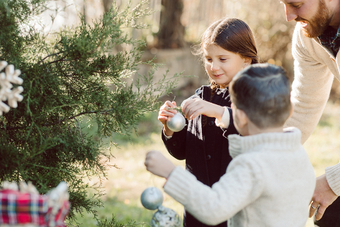 Brooke reached out to me for holiday family session and she had plans, props and we were all looking forward to Brooke and Mike’s holiday family session with their two kids Grace and Tommy at Historic Richmond Town in Staten Island NY. Brooke and Mike are from Staten Island and they did not live too far from Historic Richmond Town and they decorate the whole town pretty festive so we decide to meet there. But like all plans Brooke’s big hope for her very first professional photoshoot didn’t go as she planed. Her two kids Grace and Tommy were not having it. As soon as they got to the parking lot Tommy fell asleep. Grace was shy and scared to have her photos taken by a stranger photographer me. But we tried and got some good cute photos, and some not so cute and grumpy photos as well. Brooke, Mike, Grace and Tommy’s Historic Richmond Town Staten Island Holiday Family session documented and  photographed by Karis from Hey Karis. Photograph is like freezing time, motion in print, movie turned into a book. Now booking 2021 and 2022 weddings.