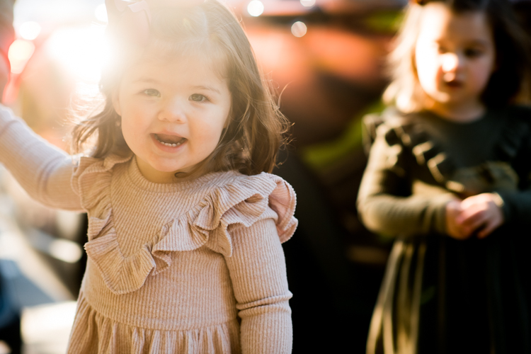 Weather was so amazing on the day I met Kristen and Anthony for their family session with three of their adorable daughters. Clare and Cass are the older two girls and from the moment I met them they showed me their fun personalities, l laughed, smiled and ran around Princeton University campus. I had such a fun time with the adorable D’Elia family. Kristen and Anthony D’Elia Fall Family Session in Princeton University campus photographed by Karis from Hey Karis. Photograph is like freezing time, motion in print, movie turned into a book.