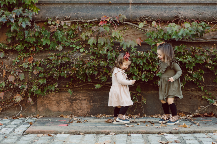 Weather was so amazing on the day I met Kristen and Anthony for their family session with three of their adorable daughters. Clare and Cass are the older two girls and from the moment I met them they showed me their fun personalities, l laughed, smiled and ran around Princeton University campus. I had such a fun time with the adorable D’Elia family. Kristen and Anthony D’Elia Fall Family Session in Princeton University campus photographed by Karis from Hey Karis. Photograph is like freezing time, motion in print, movie turned into a book.