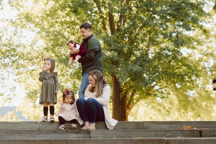 Weather was so amazing on the day I met Kristen and Anthony for their family session with three of their adorable daughters. Clare and Cass are the older two girls and from the moment I met them they showed me their fun personalities, l laughed, smiled and ran around Princeton University campus. I had such a fun time with the adorable D’Elia family. Kristen and Anthony D’Elia Fall Family Session in Princeton University campus photographed by Karis from Hey Karis. Photograph is like freezing time, motion in print, movie turned into a book.