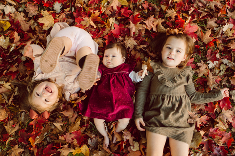 Weather was so amazing on the day I met Kristen and Anthony for their family session with three of their adorable daughters. Clare and Cass are the older two girls and from the moment I met them they showed me their fun personalities, l laughed, smiled and ran around Princeton University campus. I had such a fun time with the adorable D’Elia family.  Kristen and Anthony D’Elia Fall Family Session in Princeton University campus photographed by Karis from Hey Karis. Photograph is like freezing time, motion in print, movie turned into a book. 