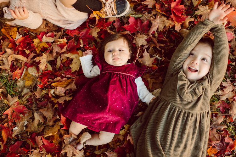 Weather was so amazing on the day I met Kristen and Anthony for their family session with three of their adorable daughters. Clare and Cass are the older two girls and from the moment I met them they showed me their fun personalities, l laughed, smiled and ran around Princeton University campus. I had such a fun time with the adorable D’Elia family. Kristen and Anthony D’Elia Fall Family Session in Princeton University campus photographed by Karis from Hey Karis. Photograph is like freezing time, motion in print, movie turned into a book.