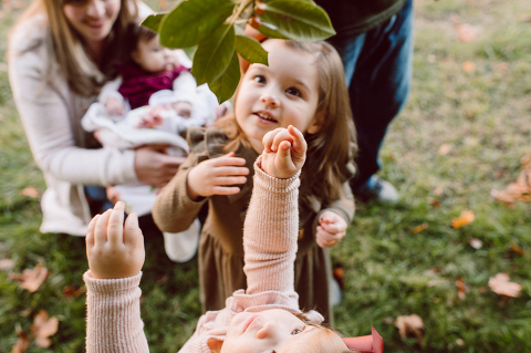 Weather was so amazing on the day I met Kristen and Anthony for their family session with three of their adorable daughters. Clare and Cass are the older two girls and from the moment I met them they showed me their fun personalities, l laughed, smiled and ran around Princeton University campus. I had such a fun time with the adorable D’Elia family.  Kristen and Anthony D’Elia Fall Family Session in Princeton University campus photographed by Karis from Hey Karis. Photograph is like freezing time, motion in print, movie turned into a book. 
