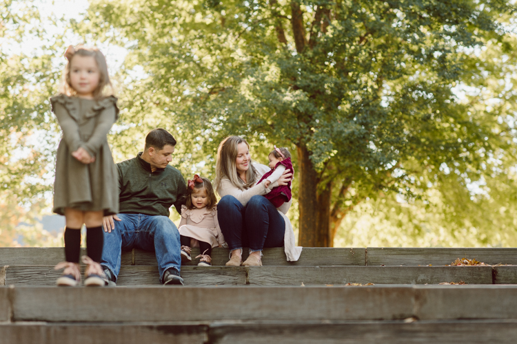 Weather was so amazing on the day I met Kristen and Anthony for their family session with three of their adorable daughters. Clare and Cass are the older two girls and from the moment I met them they showed me their fun personalities, l laughed, smiled and ran around Princeton University campus. I had such a fun time with the adorable D’Elia family. Kristen and Anthony D’Elia Fall Family Session in Princeton University campus photographed by Karis from Hey Karis. Photograph is like freezing time, motion in print, movie turned into a book.