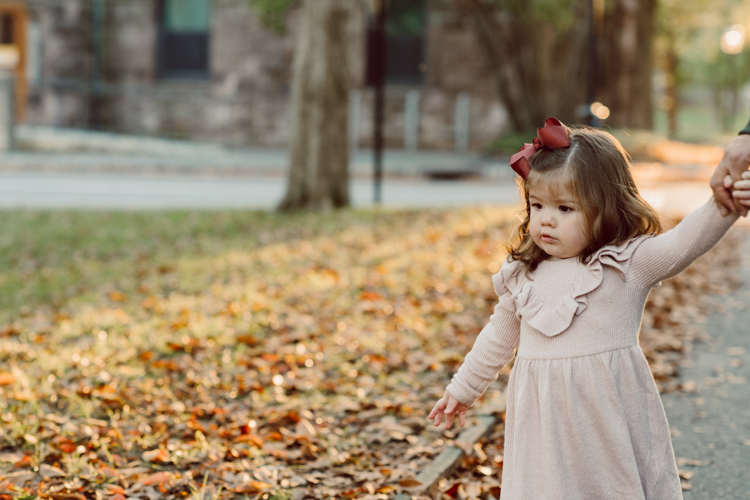 Weather was so amazing on the day I met Kristen and Anthony for their family session with three of their adorable daughters. Clare and Cass are the older two girls and from the moment I met them they showed me their fun personalities, l laughed, smiled and ran around Princeton University campus. I had such a fun time with the adorable D’Elia family. Kristen and Anthony D’Elia Fall Family Session in Princeton University campus photographed by Karis from Hey Karis. Photograph is like freezing time, motion in print, movie turned into a book.