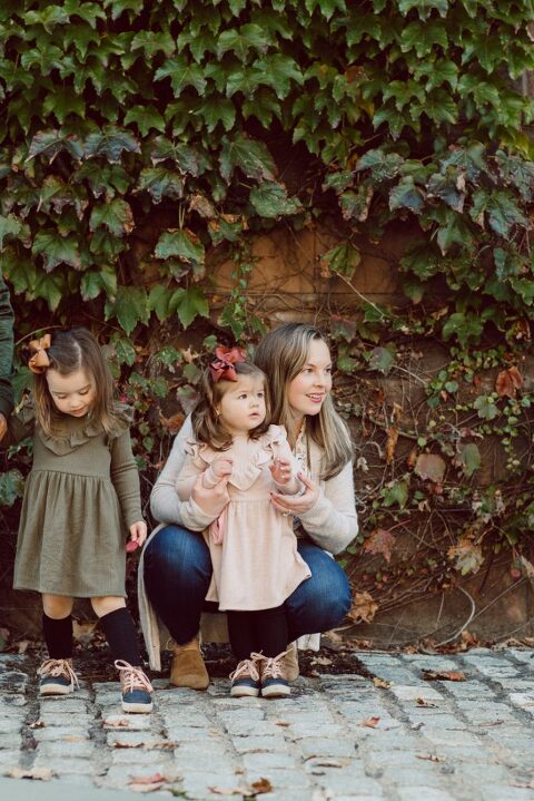 Weather was so amazing on the day I met Kristen and Anthony for their family session with three of their adorable daughters. Clare and Cass are the older two girls and from the moment I met them they showed me their fun personalities, l laughed, smiled and ran around Princeton University campus. I had such a fun time with the adorable D’Elia family.  Kristen and Anthony D’Elia Fall Family Session in Princeton University campus photographed by Karis from Hey Karis. Photograph is like freezing time, motion in print, movie turned into a book. 