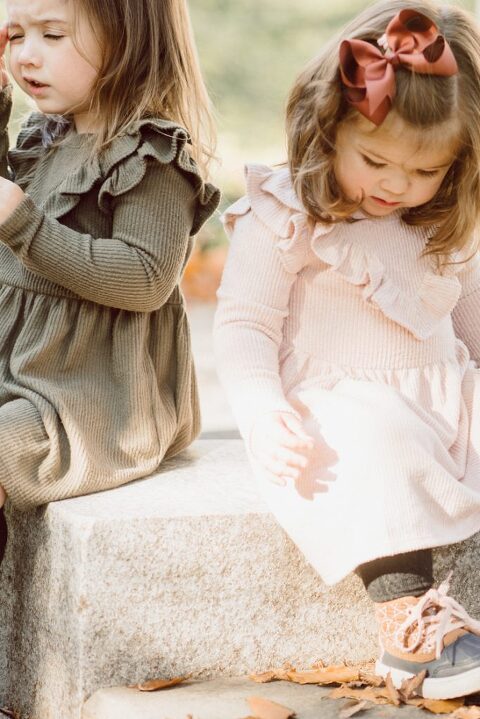 Weather was so amazing on the day I met Kristen and Anthony for their family session with three of their adorable daughters. Clare and Cass are the older two girls and from the moment I met them they showed me their fun personalities, l laughed, smiled and ran around Princeton University campus. I had such a fun time with the adorable D’Elia family.  Kristen and Anthony D’Elia Fall Family Session in Princeton University campus photographed by Karis from Hey Karis. Photograph is like freezing time, motion in print, movie turned into a book. 