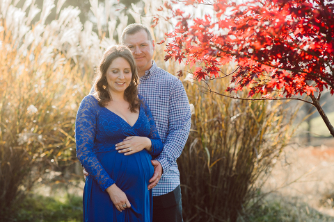 Lisa and Jamie chose to goto Ninety Acres at Natirar NJ because that’s where Jamie proposed to Lisa and had dinner. Since then Lisa and Jamie go back to Ninety Acres to celebrate their anniversary.  And we came here for Lisa and Jamie’s maternity session, a special place in their hearts and once the baby arrives as a family of three they will come celebrate their anniversary with their baby boy. Maybe because it was a special place for Lisa and Jamie, the weather was so beautiful, sunset was so glorious. Lisa and Jamie’s maternity session at Ninety Acres at Natirara NJ  photographed by Karis from Hey Karis. Photograph is like freezing time, motion in print, movie turned into a book. Now booking 2021 and 2022 weddings.