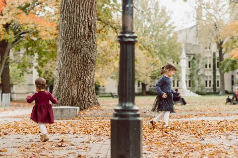 Windy morning spent at Princeton University Campus with Melissa, Joe, Everly and Cecilia. Everyone was bit cold and new to this family session but soon after how much fun and silly we can be during the photo session Everly warmed up, took her jacker off and ran. She ran, fell, hopped and would not stop posing for me. Till the moment we were ready to go home Everly posed, asked me to take more photos of her. Such a fun time with Bowen family during their family session at Princeton NJ photographed by Karis from Hey Karis. Photograph is like freezing time, motion in print, movie turned into a book. Now booking 2021 and 2022 weddings.