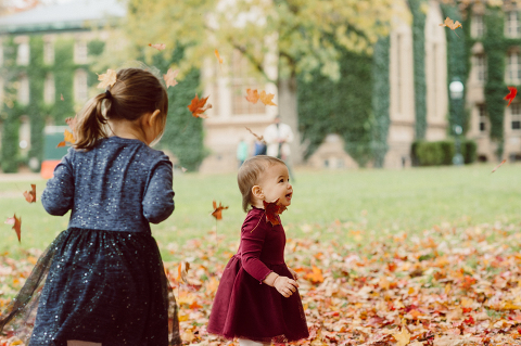 Windy morning spent at Princeton University Campus with Melissa, Joe, Everly and Cecilia. Everyone was bit cold and new to this family session but soon after how much fun and silly we can be during the photo session Everly warmed up, took her jacker off and ran. She ran, fell, hopped and would not stop posing for me. Till the moment we were ready to go home Everly posed, asked me to take more photos of her. Such a fun time with Bowen family during their family session at Princeton NJ photographed by Karis from Hey Karis. Photograph is like freezing time, motion in print, movie turned into a book. Now booking 2021 and 2022 weddings.