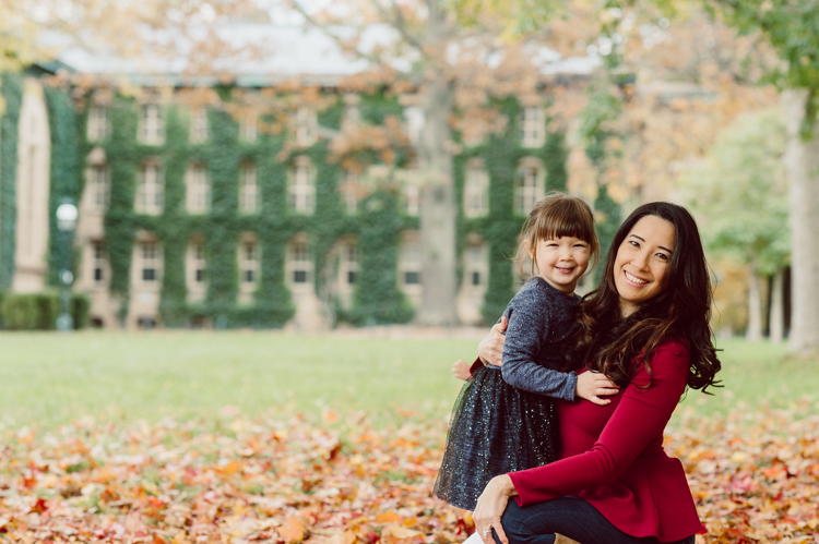 Windy morning spent at Princeton University Campus with Melissa, Joe, Everly and Cecilia. Everyone was bit cold and new to this family session but soon after how much fun and silly we can be during the photo session Everly warmed up, took her jacker off and ran. She ran, fell, hopped and would not stop posing for me. Till the moment we were ready to go home Everly posed, asked me to take more photos of her. Such a fun time with Bowen family during their family session at Princeton NJ photographed by Karis from Hey Karis. Photograph is like freezing time, motion in print, movie turned into a book. Now booking 2021 and 2022 weddings.