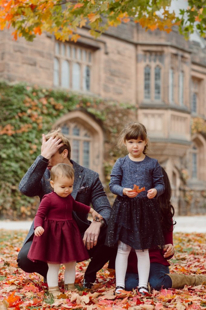 Windy morning spent at Princeton University Campus with Melissa, Joe, Everly and Cecilia. Everyone was bit cold and new to this family session but soon after how much fun and silly we can be during the photo session Everly warmed up, took her jacker off and ran. She ran, fell, hopped and would not stop posing for me. Till the moment we were ready to go home Everly posed, asked me to take more photos of her. Such a fun time with Bowen family during their family session at Princeton NJ photographed by Karis from Hey Karis. Photograph is like freezing time, motion in print, movie turned into a book. Now booking 2021 and 2022 weddings.