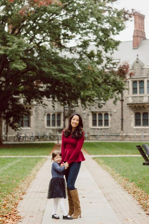 Windy morning spent at Princeton University Campus with Melissa, Joe, Everly and Cecilia. Everyone was bit cold and new to this family session but soon after how much fun and silly we can be during the photo session Everly warmed up, took her jacker off and ran. She ran, fell, hopped and would not stop posing for me. Till the moment we were ready to go home Everly posed, asked me to take more photos of her. Such a fun time with Bowen family during their family session at Princeton NJ photographed by Karis from Hey Karis. Photograph is like freezing time, motion in print, movie turned into a book. Now booking 2021 and 2022 weddings.