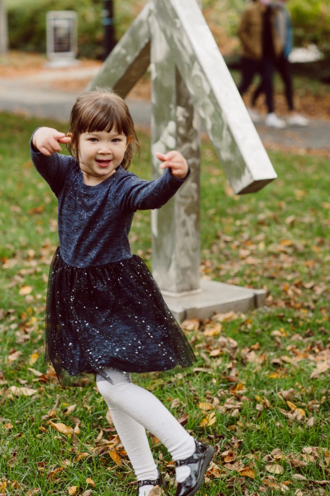 Windy morning spent at Princeton University Campus with Melissa, Joe, Everly and Cecilia. Everyone was bit cold and new to this family session but soon after how much fun and silly we can be during the photo session Everly warmed up, took her jacker off and ran. She ran, fell, hopped and would not stop posing for me. Till the moment we were ready to go home Everly posed, asked me to take more photos of her. Such a fun time with Bowen family during their family session at Princeton NJ photographed by Karis from Hey Karis. Photograph is like freezing time, motion in print, movie turned into a book. Now booking 2021 and 2022 weddings.