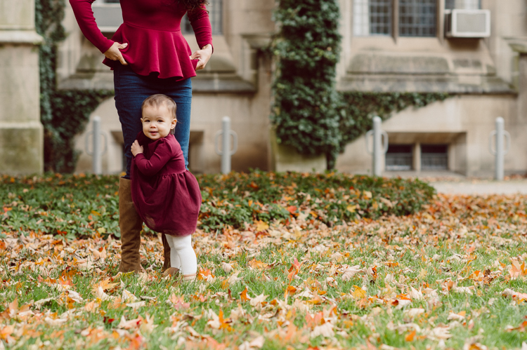 Windy morning spent at Princeton University Campus with Melissa, Joe, Everly and Cecilia. Everyone was bit cold and new to this family session but soon after how much fun and silly we can be during the photo session Everly warmed up, took her jacker off and ran. She ran, fell, hopped and would not stop posing for me. Till the moment we were ready to go home Everly posed, asked me to take more photos of her. Such a fun time with Bowen family during their family session at Princeton NJ photographed by Karis from Hey Karis. Photograph is like freezing time, motion in print, movie turned into a book. Now booking 2021 and 2022 weddings.
