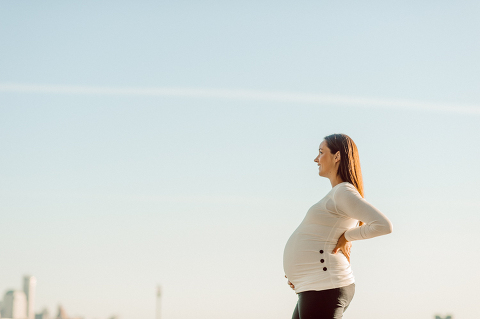 Very hot & sunny afternoon in November I met with Sam and Nick for the maternity session. This expecting parents brought their two fur babies out with them in the hopes of getting some photos of just four before the baby comes next months. Their puppies Cats and Cabo are shih-poos (shih Tzu and Toy Poodle mix) and are too adorable. With Case, Cabo walking along their parents sides we walked along the waterfront of Hoboken NJ. Sam was literally glowing like a porcelain doll and Nick looked so excited and a bit nervous for boy’s arrival. Sam and Nick’s maternity/family session in Hoboken NJ photographed by Karis from Hey Karis. Photograph is like freezing time, motion in print, movie turned into a book. Now booking 2021 and 2022 weddings.