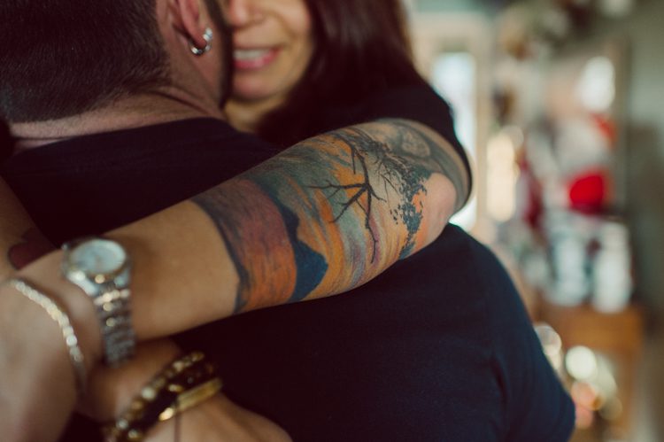 When Cristina and Nick mentioned that they want to do a day in the life, lifestyle type of engagement session at comfort of their home I was all in. What other places on earth other than your home describes you the most! You are most comfortable in your own home, and it shows in these engagement photos of Cristina and Nick that they were cozy. I sensed that Cristina and Nick were both bit shy, quiet, introverts so doing their engagement session at their home made it easier for them to open up and warm up to me. They showed me around their house, telling me stories about the electric guitars on the wall, plants, Nick's mom's snowman collections and into the basement where I saw Nick's Marvel and Super Hero collections. We took photos in all their familiar spaces around the house then out back by the fire pit where Nick had already started the fire before I came. Cristina and Nick told me that's where they love to hang out the most, fire pit with drinks in their hands, cozying up with a blanket over them. Funny story, Cristina and Nick's first date was at the house because they met in the beginning of COVID lockdown and had no where to go so Nick lite the fire pit and they had their romantic fire pit first date. And rest is history! So their engagement session at home in Wayne just made sense. Before the session was over we had to take one last photo with super hero helmet! of course Nick picks Iron Man and Cristina got stuck w Ant Man. I loved Cristina and Nick's calm vibe and getting to know them through my lens during their home engagement session captured by NY NJ Documentary Wedding Photographer Karis from Hey Karis, photographing your wedding, capturing your love and documenting your life.