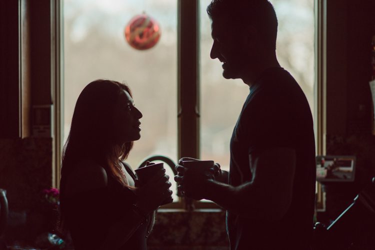When Cristina and Nick mentioned that they want to do a day in the life, lifestyle type of engagement session at comfort of their home I was all in. What other places on earth other than your home describes you the most! You are most comfortable in your own home, and it shows in these engagement photos of Cristina and Nick that they were cozy. I sensed that Cristina and Nick were both bit shy, quiet, introverts so doing their engagement session at their home made it easier for them to open up and warm up to me. They showed me around their house, telling me stories about the electric guitars on the wall, plants, Nick's mom's snowman collections and into the basement where I saw Nick's Marvel and Super Hero collections. We took photos in all their familiar spaces around the house then out back by the fire pit where Nick had already started the fire before I came. Cristina and Nick told me that's where they love to hang out the most, fire pit with drinks in their hands, cozying up with a blanket over them. Funny story, Cristina and Nick's first date was at the house because they met in the beginning of COVID lockdown and had no where to go so Nick lite the fire pit and they had their romantic fire pit first date. And rest is history! So their engagement session at home in Wayne just made sense. Before the session was over we had to take one last photo with super hero helmet! of course Nick picks Iron Man and Cristina got stuck w Ant Man. I loved Cristina and Nick's calm vibe and getting to know them through my lens during their home engagement session captured by NY NJ Documentary Wedding Photographer Karis from Hey Karis, photographing your wedding, capturing your love and documenting your life.