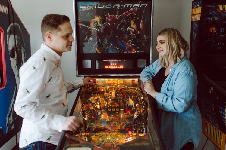 I photographed Andrea and Matt's wedding at The Rock Island Lake Club back in 2017, week ago I went to visit them at their house in Sparta NJ to photograph their little family of three. Andrea and Matt and their adorable french bull dog Lucy. I documented their day by walking Lucy, hanging out in the back with fire pit, hung out in the basement with all their pinball machines. Documenting day in the life of Andrea and Matt was such a delight. Andrea and Matt's day in the life captured by NY NJ Documentary Wedding Photographer Karis from Hey Karis, photographing your wedding, capturing your love and documenting your life.