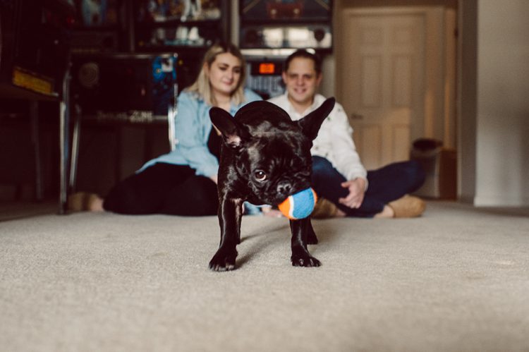 I photographed Andrea and Matt's wedding at The Rock Island Lake Club back in 2017, week ago I went to visit them at their house in Sparta NJ to photograph their little family of three. Andrea and Matt and their adorable french bull dog Lucy. I documented their day by walking Lucy, hanging out in the back with fire pit, hung out in the basement with all their pinball machines. Documenting day in the life of Andrea and Matt was such a delight. Andrea and Matt's day in the life captured by NY NJ Documentary Wedding Photographer Karis from Hey Karis, photographing your wedding, capturing your love and documenting your life.