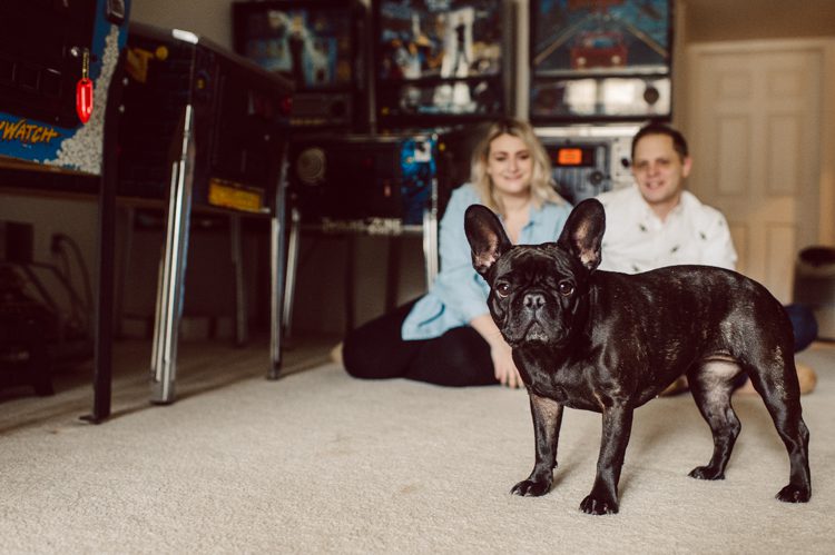 I photographed Andrea and Matt's wedding at The Rock Island Lake Club back in 2017, week ago I went to visit them at their house in Sparta NJ to photograph their little family of three. Andrea and Matt and their adorable french bull dog Lucy. I documented their day by walking Lucy, hanging out in the back with fire pit, hung out in the basement with all their pinball machines. Documenting day in the life of Andrea and Matt was such a delight. Andrea and Matt's day in the life captured by NY NJ Documentary Wedding Photographer Karis from Hey Karis, photographing your wedding, capturing your love and documenting your life.