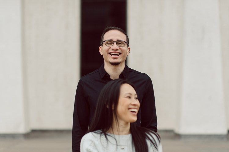 Since COVID-19 and the whole social distancing got all the colleges and universities to go virtual. Princeton University campus was empty the whole summer and fall, more people crowed to enjoy the historic campus with it's stunning architecture. Archways, columns and now award winning modern buildings make up this prestigious Princeton University Campus. When classes are in session, photograph is not permitted so now with the campus being empty all the photographers took the opportunity. I also had several photoshoots previous to Christina and GP's engagement session. Christina and GP being my last engagement session of 2020, I wanted it to be special, bit different. I wanted to see something new in this place that I've already been. After I met up with Christina and GP I took a new route around the campus, on the outer skirts to see if I find anything interesting, to get inspired. I laughed so much during the engagement session with Christina and GP, I think I cried a little. Fun Engagement Session with Christina and GP in Princeton University captured by NY NJ Documentary Wedding Photographer Karis from Hey Karis, photographing your wedding moments cinematically.