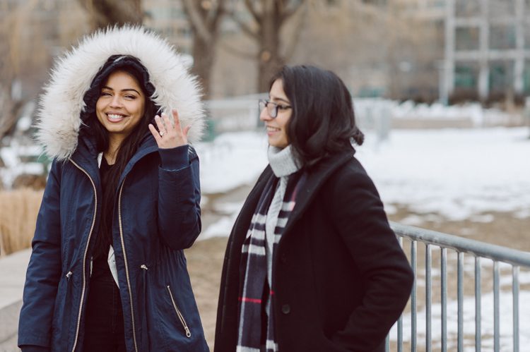 Gantry Plaza State Park LIC, Jay proposed to his girlfriend Aditi the day before valentines day on February 13, 2021 and coldest day! Aditi and Jay met during school while they were studying for MBA at NYU. Proposal totally caught Aditi by surprise, Jay fell on one knee on the edge of Gantry Plaza State Park LIC pulled out the most beautiful diamond ring. With excitement and over joyed hearts, as fiancés we waked around Gantry Plaza State Park to Queens Public Library for quick portraits of the lovers before sending them away for their engagement celebration. Aditi and Jay's Gantry Plaza State Park LIC proposal photograph captured by Hey Karis documenting elopements and weddings in NY NJ and planet earth.