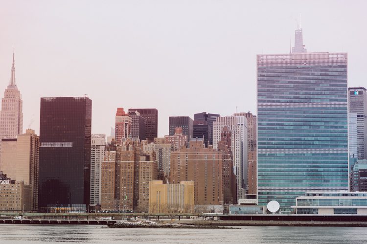 Gantry Plaza State Park LIC, Jay proposed to his girlfriend Aditi the day before valentines day on February 13, 2021 and coldest day! Aditi and Jay met during school while they were studying for MBA at NYU. Proposal totally caught Aditi by surprise, Jay fell on one knee on the edge of Gantry Plaza State Park LIC pulled out the most beautiful diamond ring. With excitement and over joyed hearts, as fiancés we waked around Gantry Plaza State Park to Queens Public Library for quick portraits of the lovers before sending them away for their engagement celebration. Aditi and Jay's Gantry Plaza State Park LIC proposal photograph captured by Hey Karis documenting elopements and weddings in NY NJ and planet earth.