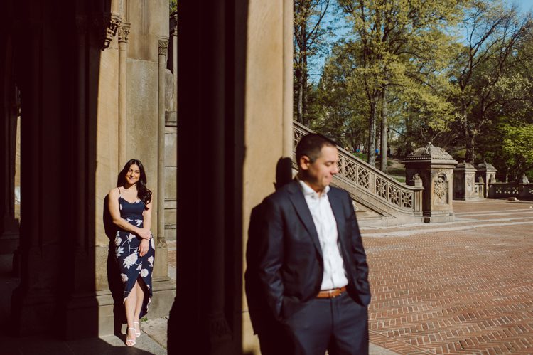 Bethesda Terrace Arcade in Central Park NY in my opinion alway so lovely. I saw Brianna and Joe standing in the middle of Bethesda Terrace next to the fountain. We walked right into the crowd of Central Park and started our engagement session. Cherry Blossoms were still in bloom along with all the spring blooms. Spring sun was brilliant and smiles on Brianna and Joe during the engagement session was so beautiful. Brianna and Joe's Bethesda Terrace Arcade in Central Park NY engagement session captured by NY NJ Weddings, Elopements and Family Photographer Karis.