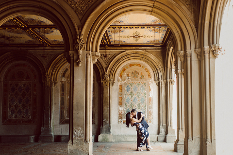 Bethesda Terrace Arcade in Central Park NY in my opinion alway so lovely. I saw Brianna and Joe standing in the middle of Bethesda Terrace next to the fountain. We walked right into the crowd of Central Park and started our engagement session. Cherry Blossoms were still in bloom along with all the spring blooms. Spring sun was brilliant and smiles on Brianna and Joe during the engagement session was so beautiful. Brianna and Joe's Bethesda Terrace Arcade in Central Park NY engagement session captured by NY NJ Weddings, Elopements and Family Photographer Karis.